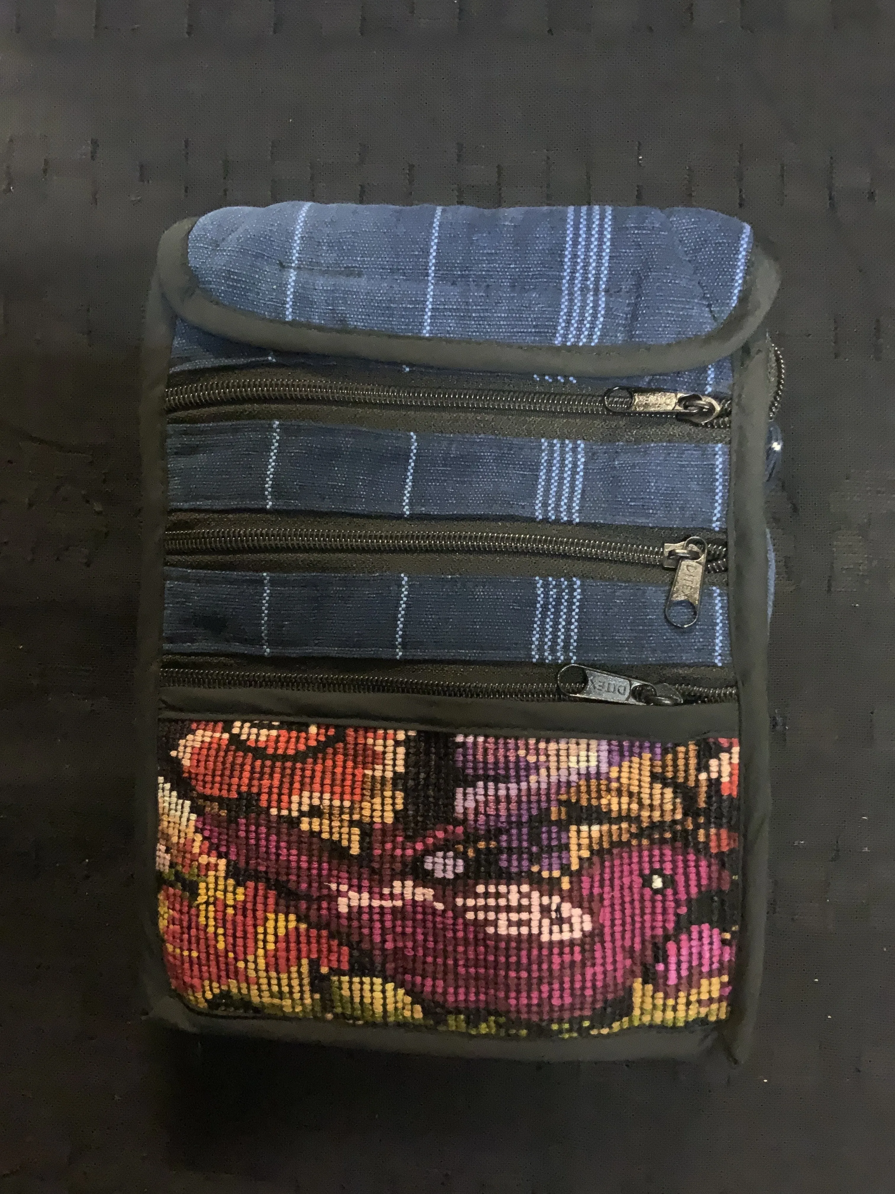 Guatemalan traveler bag in handwoven fabric with a patch of vintage huipil fabric.  7” x 9.5” with an adjustable 48” shoulder st