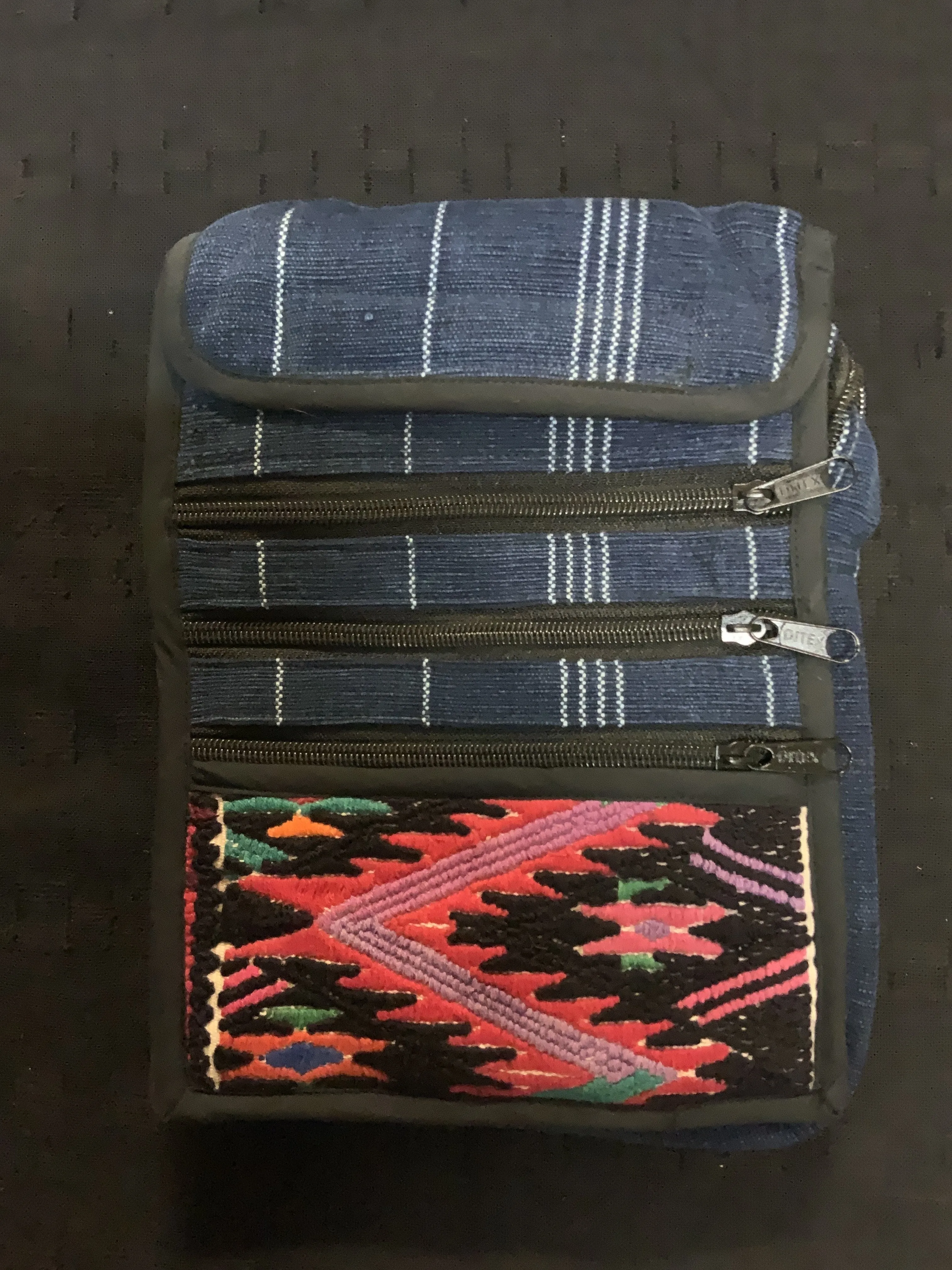 Guatemalan traveler bag in handwoven fabric with a patch of vintage huipil fabric.  7” x 9.5” with an adjustable 48” shoulder st